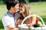 Attractive Couple On Romantic Picnic In Countryside Stock Photo