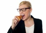 Businesswoman Eating Stock Photo