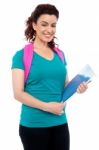 Student With Backpack And Notebook Stock Photo