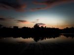 Scenery Of The Wooden Pier In Urban Stock Photo