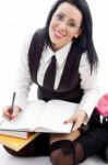 Female Student Making Her Notes Stock Photo