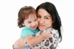 Loving Mother Hugging Her Daughter Stock Photo