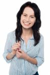 Smiling Young Girl Posing Casually Stock Photo