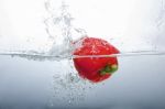 Red Bell Pepper Splashing Stock Photo