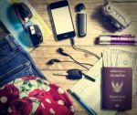 Set Of Travel Accessory On Wooden Table Stock Photo