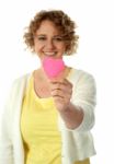 Mature Woman Holding Paper Heart Stock Photo