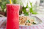 Red Watermelon Juice And Tofu Vegetable Fried Rice Stock Photo