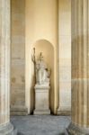 Statue Of Minerva Under The Brandenburg Gate In Berlin Stock Photo