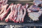 Traditional Meat Grilled On The Grill In The Argentine Countryside Stock Photo