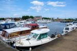 Boats Moored On Oulton Broad Stock Photo