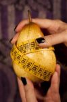 Pear With Measuring Tape Stock Photo