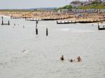 People Enjoying The Beach At Southwold Stock Photo