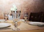 Glasses And Plates On Table Stock Photo