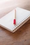 Work Station With Notebook And Pencil With Vintage Filter Stock Photo