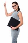 Pretty Employee Raising Her Arm Up Stock Photo