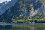 Castle Schloss On The Shoreline Of Lake Hallstatt Stock Photo