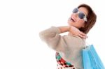 Happy Young Woman With Shopping Bags On White Stock Photo