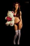 Young Woman With A Teddy Bear Wearing Lingerie Stock Photo