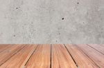 Top Of Wood Table On Old Concrete Wall Background Stock Photo