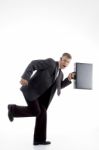 Businessman Running With Briefcase Stock Photo