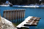 Floating Boats Covered In Snow At Walchensee Lake In Bavaria Ger Stock Photo