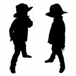 Silhouettes Of Two Little Boys Stock Photo