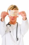 Surgeon Holding Euro Stock Photo