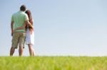 Hugging Young Couple Stock Photo