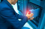 Man Fix Server Network In Data Center Room Stock Photo