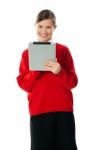 Smiling Girl Using Tablet Pc Stock Photo