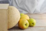 Melon On Wood Flooring Stock Photo