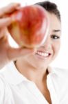 Smiling Young Female Showing Apple Stock Photo