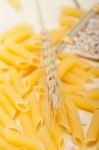 Italian Pasta Penne With Wheat Stock Photo