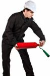 Handyman Wearing Uniform And Hardhat Stock Photo