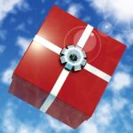 Red Giftbox With Sky Background Stock Photo