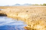 Sandy Beach With Blur Sea On Background Stock Photo