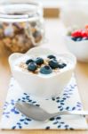 Healthy Breakfast With Granola, Yogurt And Fresh Fruits Stock Photo