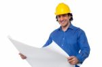 Construction Worker Reviewing Blueprint Stock Photo