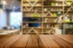 Selected Focus Empty Brown Wooden Table And Coffee Shop Or Resta Stock Photo