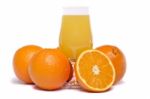 Bunch Of Oranges With Juice Stock Photo