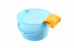 Blue Plastic Bucket And Yellow Cloth Stock Photo