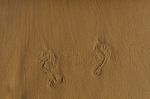 Footprints On Sand Stock Photo