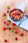 Bran Flakes With Fresh Raspberries And Strawberries And Pitcher Stock Photo