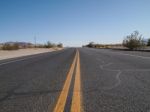 Driving Through The Desert Stock Photo