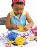 Child Playing With Kitchen Utensil Stock Photo