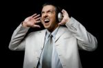 Businessman Listening Music Stock Photo