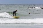 Surfing At Bude In Cornwall Stock Photo