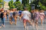 Blurry People Walking In The Street Stock Photo