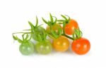 Small Tomato Isolated On The White Background Stock Photo