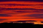 Red Sunset Sky With Clouds Stock Photo